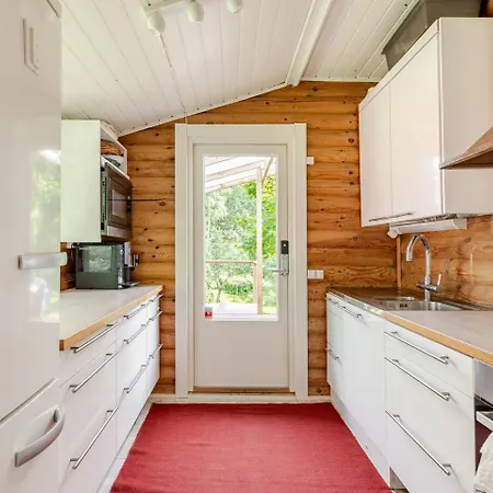 Hirsimökki Kansallispuistossa Lomamökit *